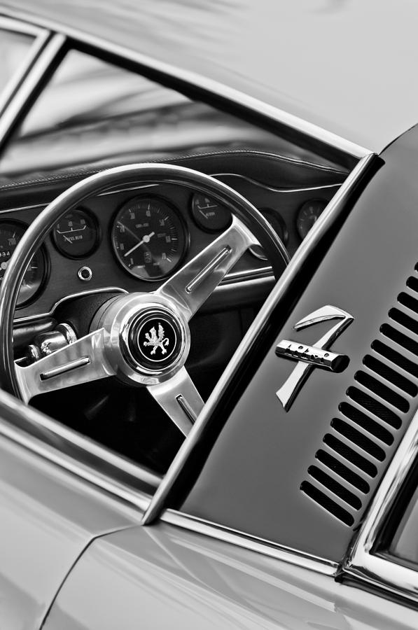 Black And White Photograph - 1971 ISO Grifo Can Am Steering Wheel Emblem by Jill Reger