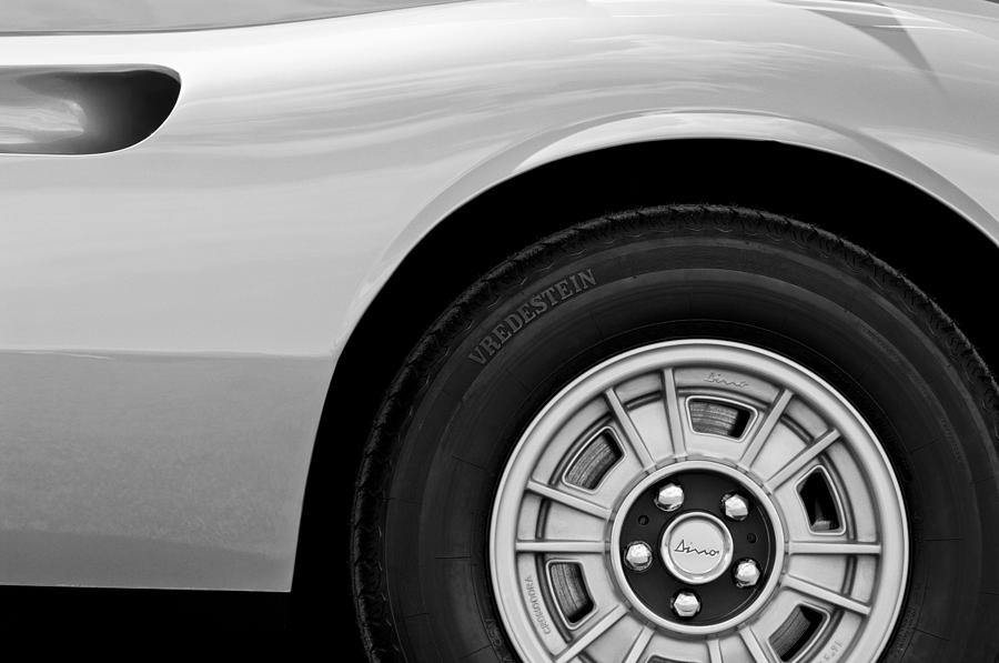 Black And White Photograph - 1973 Ferrari 246 Dino GTS Wheel Emblem by Jill Reger