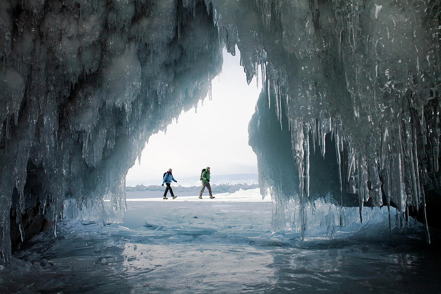 A Couple Of Hikers On The Frozen Lake #1 Photograph by Olivier Renck ...