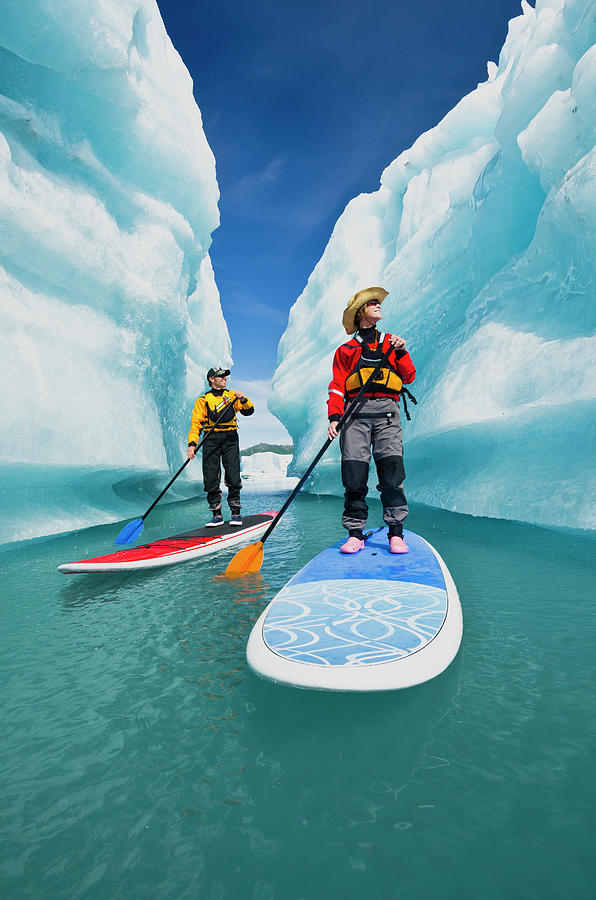 Kenai Fjords National Park Photograph - A Couple On Stand Up Paddle Boards Sup #1 by Turner Forte