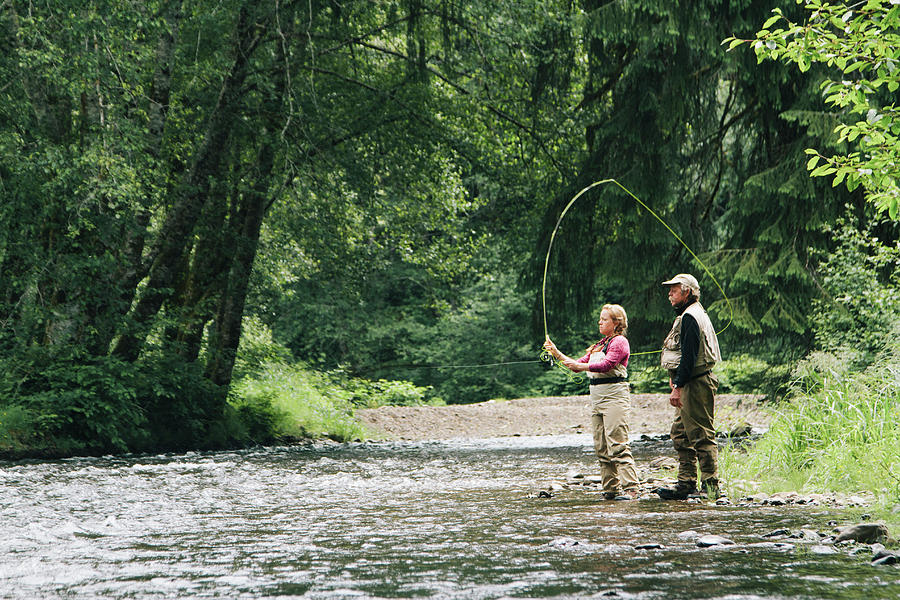 A Father And Daughter Fly Fishing #1 by Justin Bailie