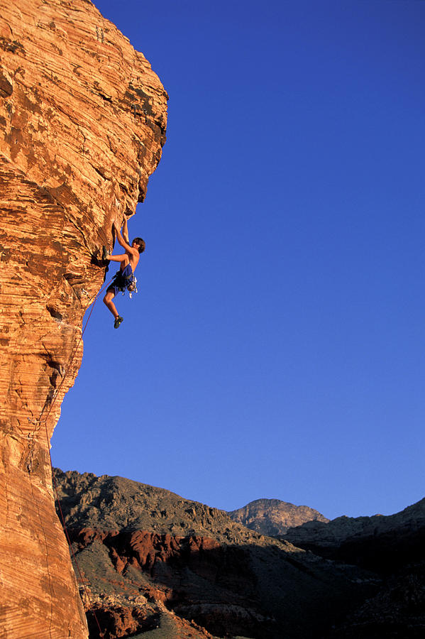 A Male Rock Climber Climbing Photograph By Corey Rich Fine Art America