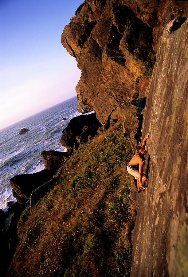 A Man Is Bouldering Near The Ocean #1 Photograph by Bennett Barthelemy A Man Is Bouldering Near The Ocean #1 Photograph by Bennett Barthelemy