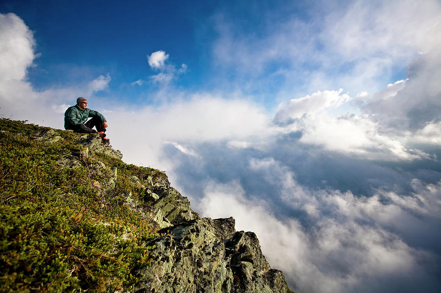 A Man Sits On A Rock Outcropping Photograph by Kirk Mastin - Fine Art ...