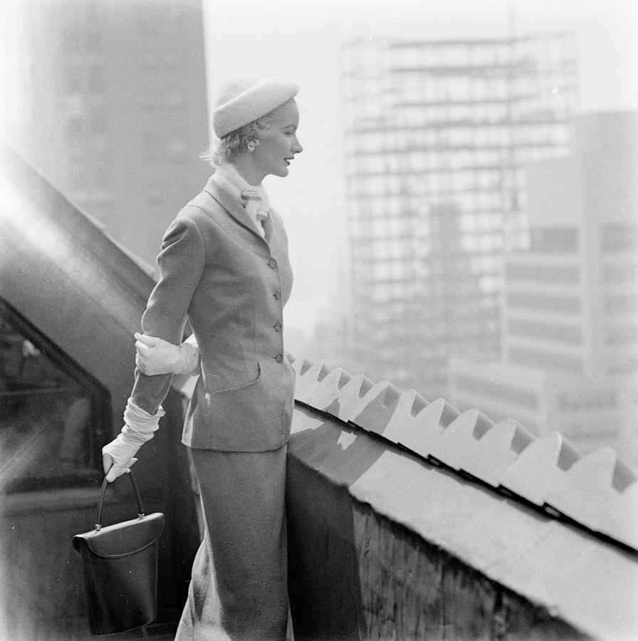 A Model In A Tweed Suit Standing On A New York #1 Photograph by Richard Rutledge