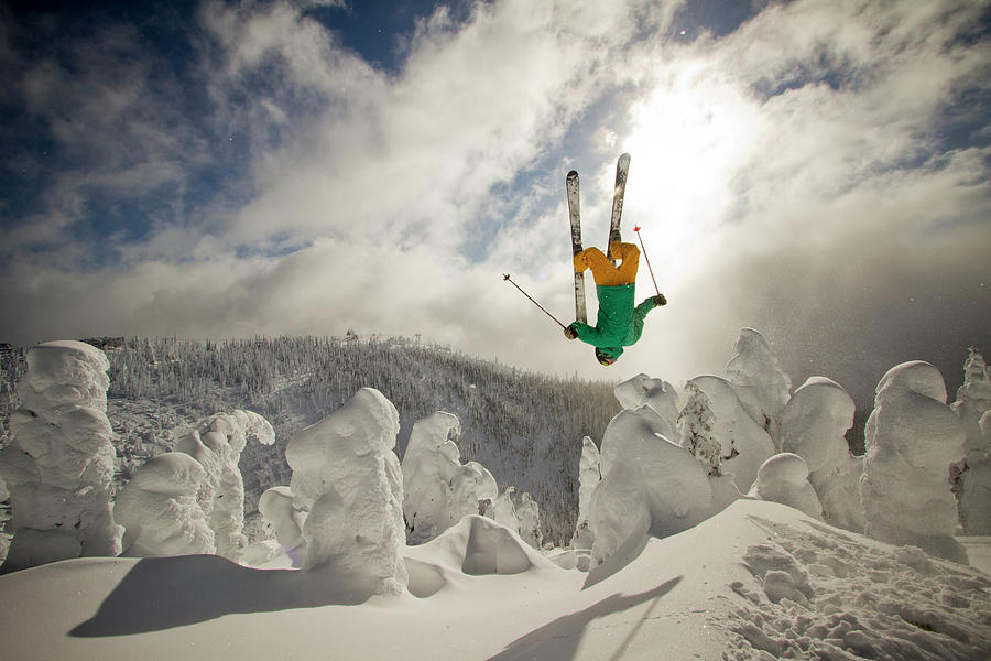 A Skier Throws A Backflip Off Of A Jump #1 Photograph by Noah Couser A Skier Throws A Backflip Off Of A Jump #1 Photograph by Noah Couser