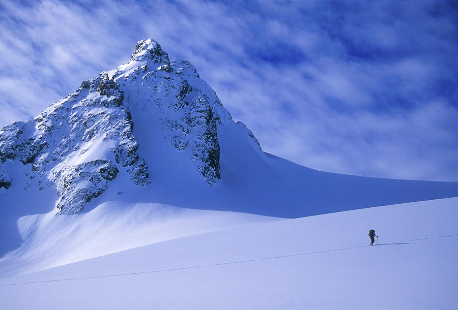 Adventure Photograph - A Woman Ski Tours And Explores 1 by Jimmy Chin Adventure Photograph - A Woman Ski Tours And Explores 1 by Jimmy Chin