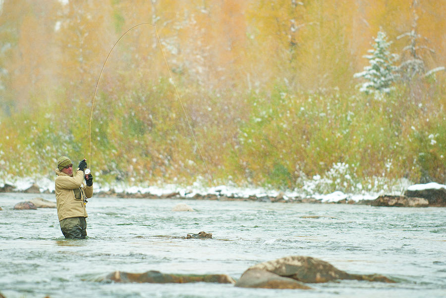 Fish Photograph - A Young Man Fly Fishes The Gros Ventre #1 by Jeff Diener