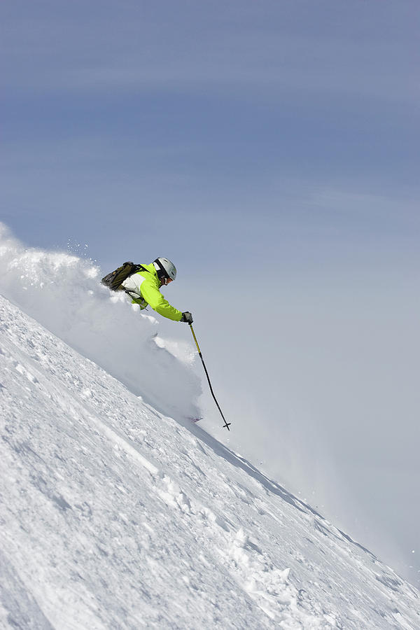 Mountain Photograph - A Young Man Skis Fresh Powder Off-piste #1 by Henry Georgi