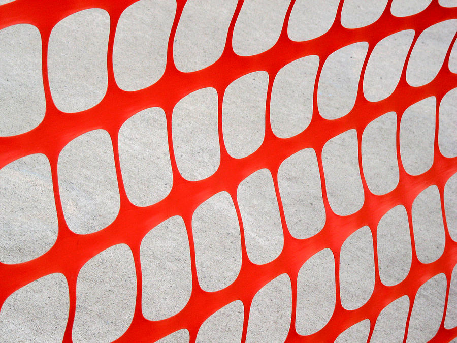 Abstract image of an orange snow fence pattern. #1 Photograph by Rob Huntley
