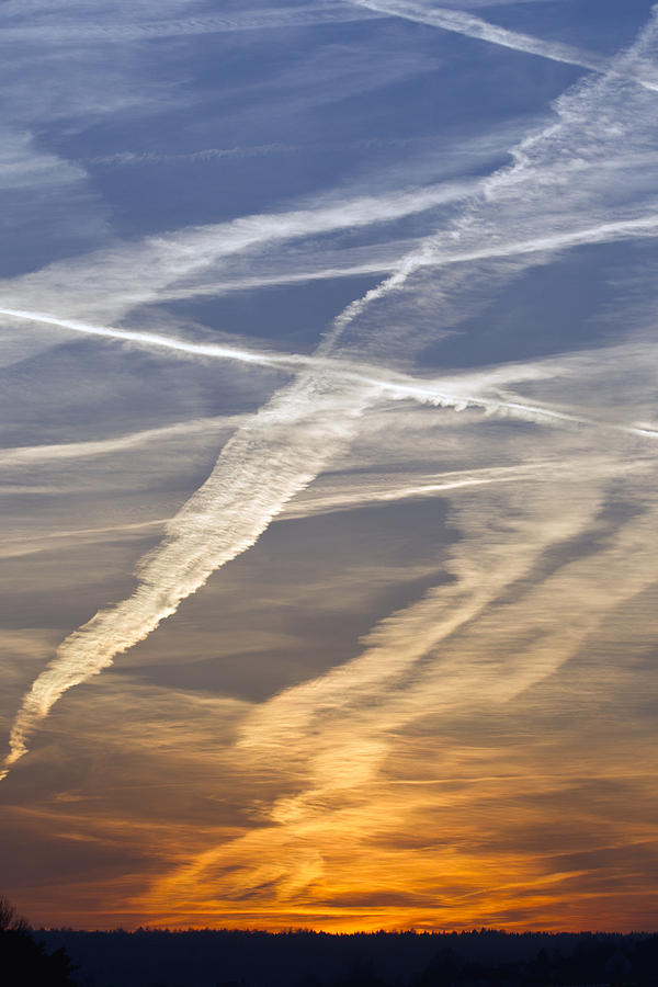 Airplane Vapor Trails At Sunset #1 Photograph by Duncan Usher