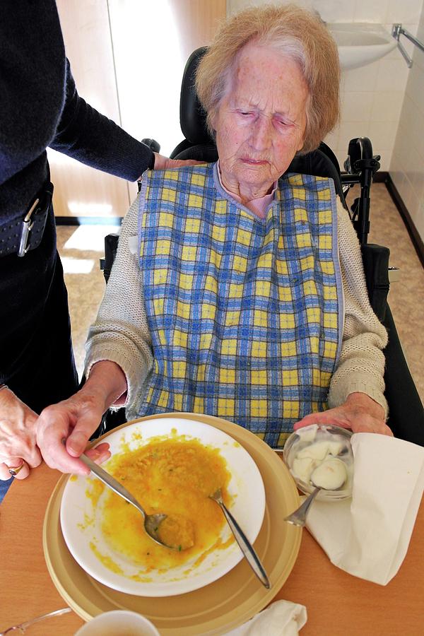 Alzheimers Patient Being Fed #1 Photograph by Tony Craddock