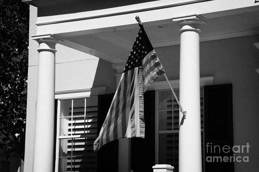 American Flag Flying On The Porch Of An Upmarket House In Florida Usa