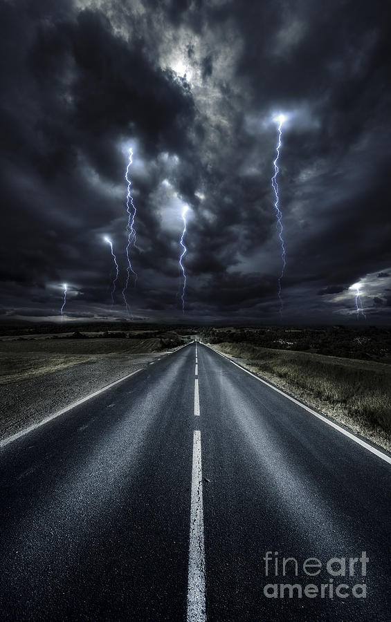 An Asphalt Road With Stormy Sky Above Photograph