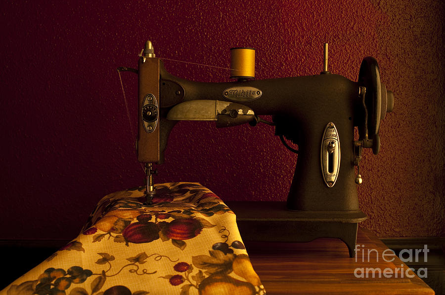 Antique Sewing Machine With Spools And Thread And Fabric Photograph