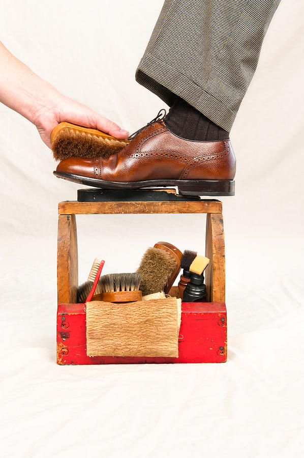Antique shoe shine box and worker #1 by Joe Belanger