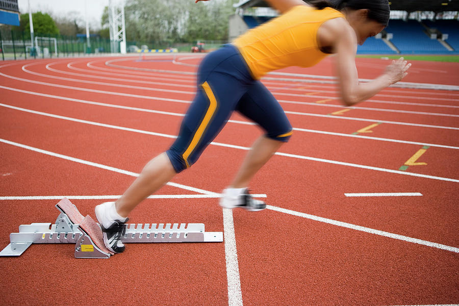 Athlete Leaving The Blocks #1 Photograph by Gustoimages/science Photo Library