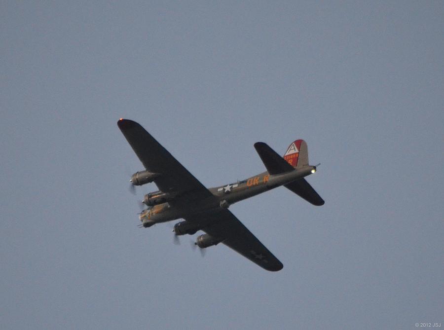 B-17 Flying Fortress WWII Bomber over Santa Rosa Sound at Twilight #1 Photograph by Jeff at JSJ Photography
