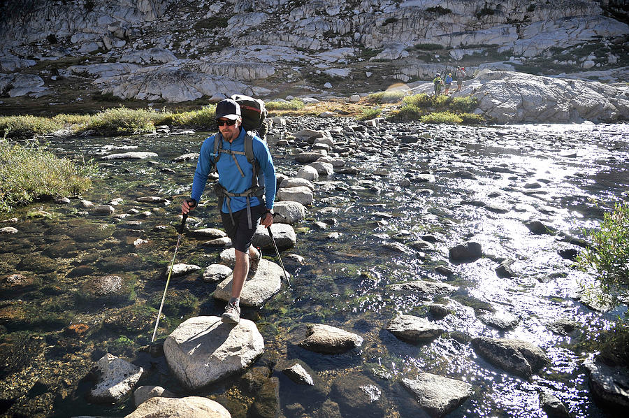 Kings Canyon National Park Photograph - Backpacker Crossing Evolution Lake #1 by HagePhoto
