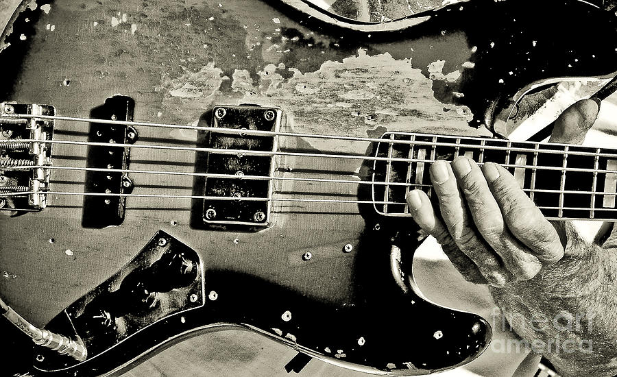 Embattled Bass Guitar Photograph by Robert Frederick