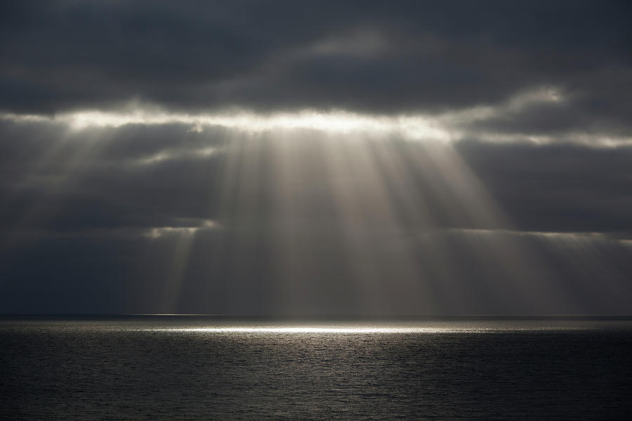 Beams Of Sunlight Over Water #1 Photograph by Travelpix Ltd