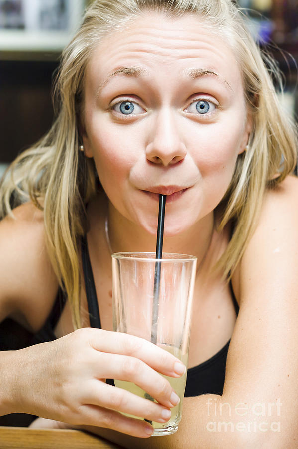 Lemon Photograph - Beautiful blonde woman drinking soda soft drink #1 by Jorgo Photography