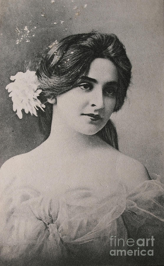 Beautiful young girl around 1910 Photograph by Patricia Hofmeester
