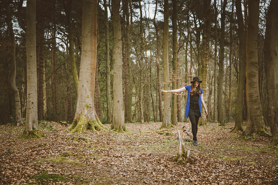 Beautiful young woman in the woods #1 Photograph by Theasis
