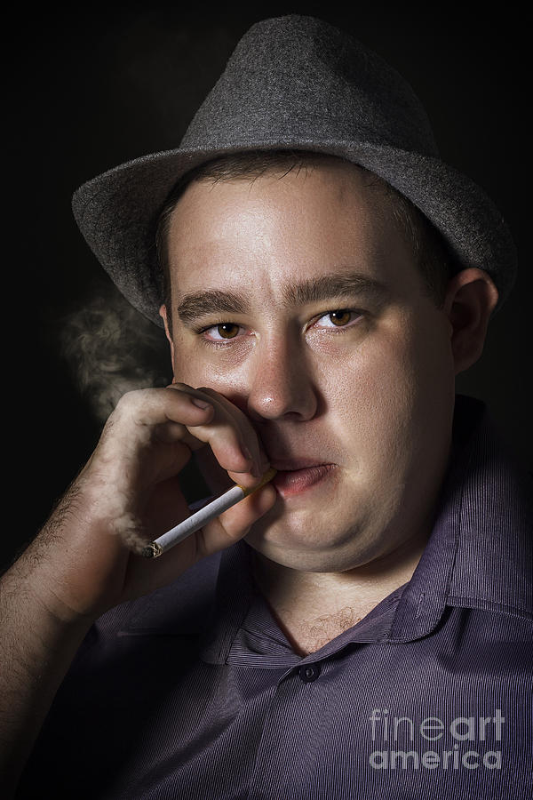 Big mob boss smoking cigarette dark background #1 Photograph by Jorgo Photography