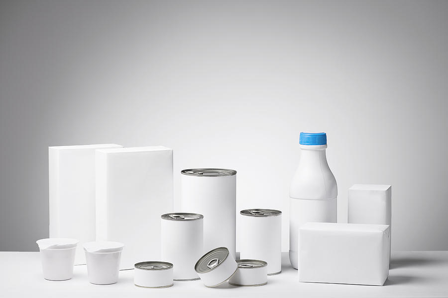 Blank labeled products on neutral white to gray gradient background #1 Photograph by Ilbusca
