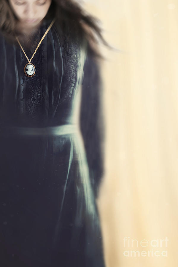 Misery Movie Photograph - Blurred image of a black mourning dress with cameo #1 by Sandra Cunningham