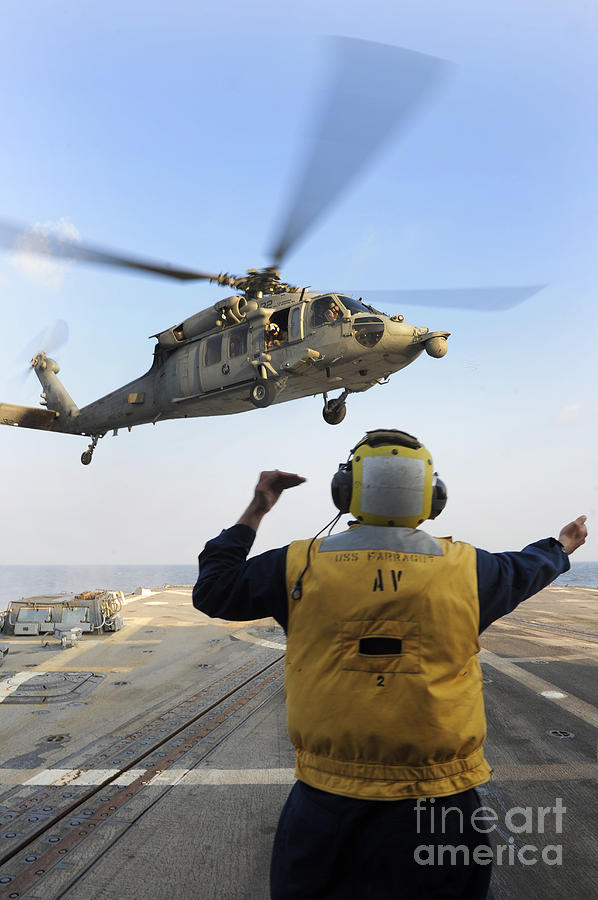 Boatswain’s Mate Directs An Mh60s Photograph by Stocktrek Images