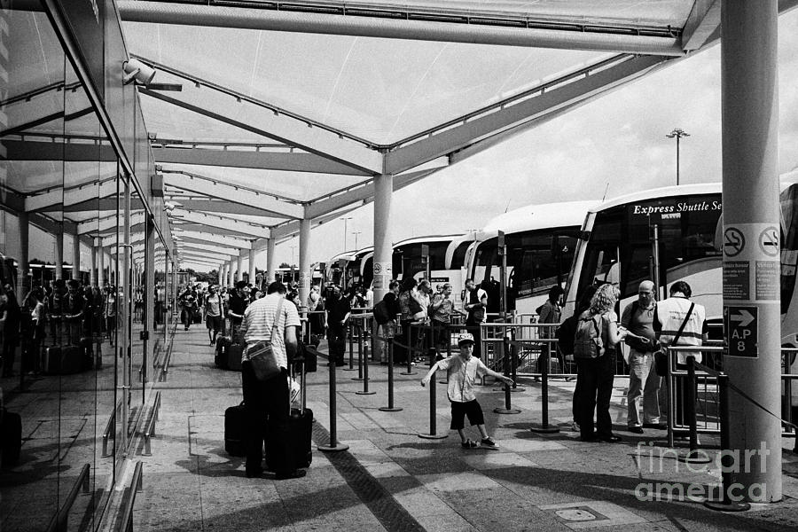 London Photograph - Bus And Coach Transfer Stop London Stansted Airport Essex England Uk #1 by Joe Fox