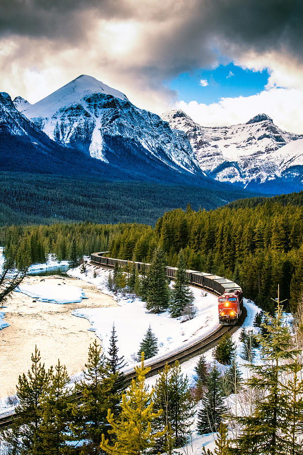 Canadian Pacific Railway Train through Banff National Park Canada #1 Photograph by Ferrantraite