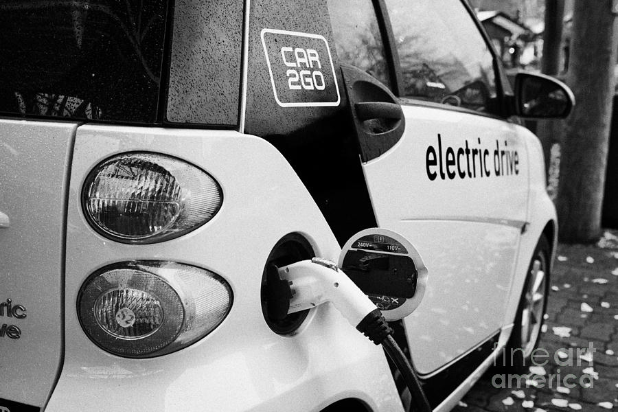 car sharing car2go electric car charging at a parking spot in Vancouver