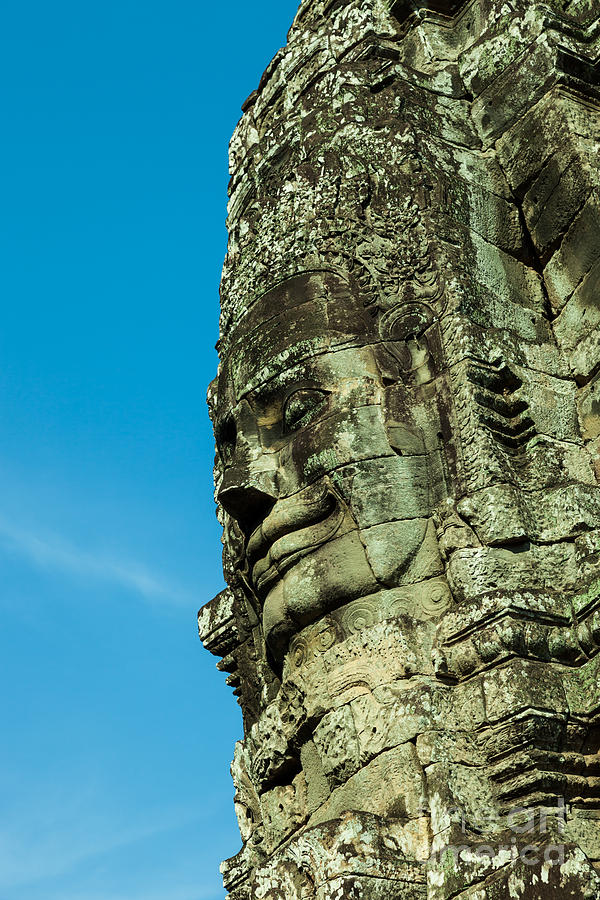 Landmark Photograph - Carved face at Bayon Temple Angkor Cambodia #1 by Fototrav Print
