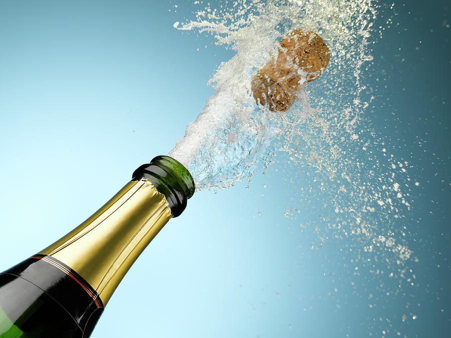 Champagne And Cork Exploding From Bottle #1 Photograph by Andy Roberts