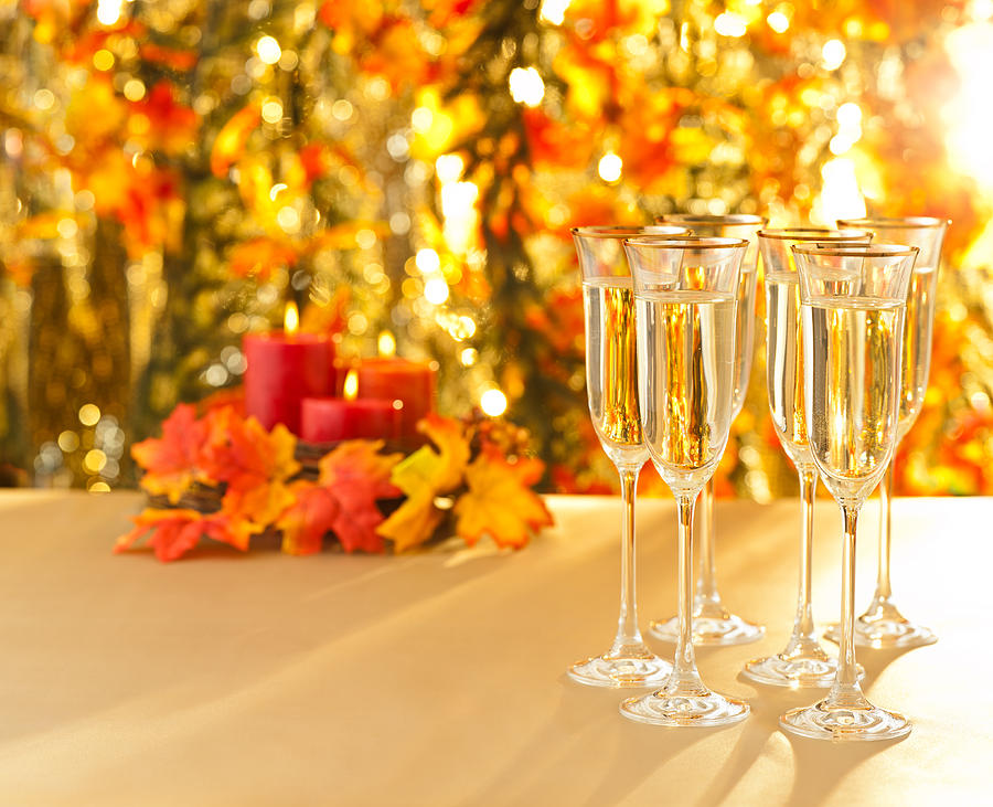 Champagne glasses for reception in front of autumn background #1 Photograph by U Schade