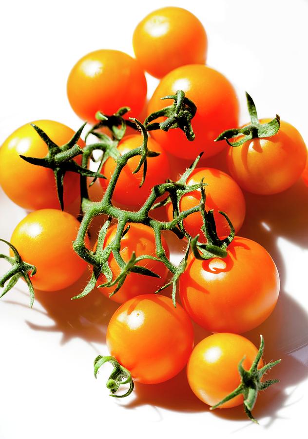 Cherry Tomatoes orange Paruche #1 Photograph by Ian Gowland