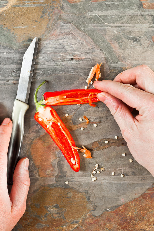 Knife Still Life Photograph - Chilli pepper #1 by Tom Gowanlock