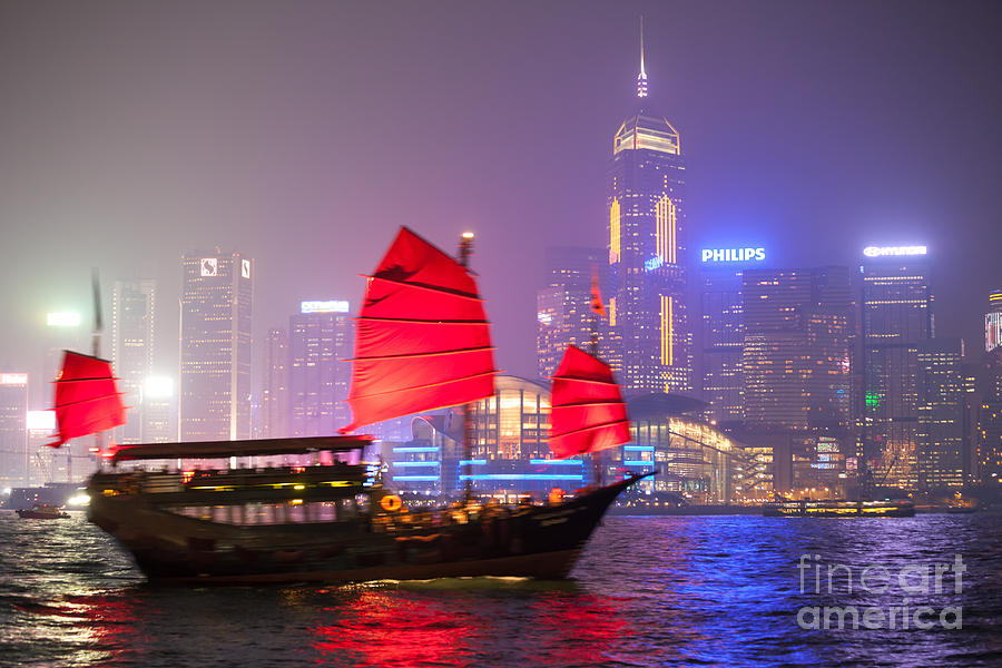 Chinese junk sail in Hong Kong harbor at night #1 Photograph by Matteo Colombo