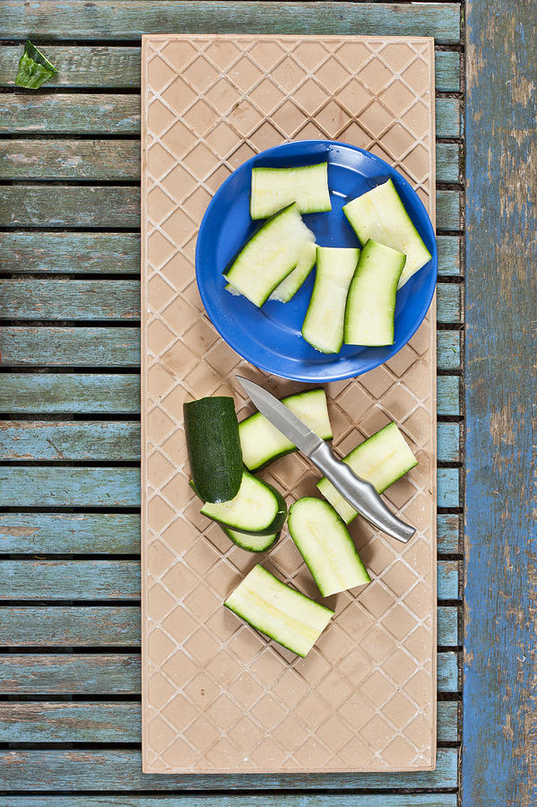 Knife Still Life Photograph - Chopped courgette #1 by Tom Gowanlock