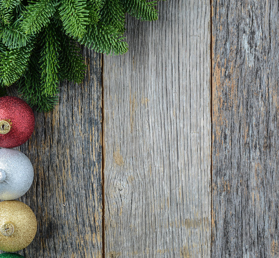 Christmas Photograph - Christmas Pine Needle and Ornaments on a Rustic Wood Background #1 by Brandon Bourdages