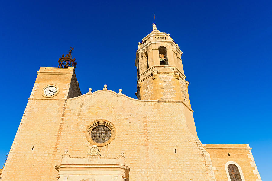 Church of Sant Bartomeu and Santa Tecla in Sitges Spain #1 Photograph by Marek Poplawski