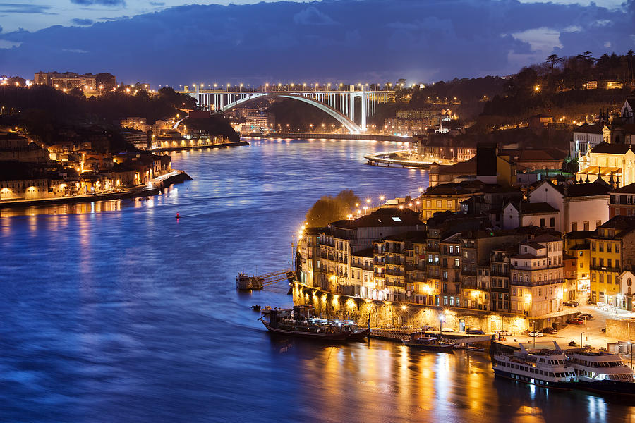 City of Porto by Douro River at Night in Portugal #1 Photograph by Artur Bogacki