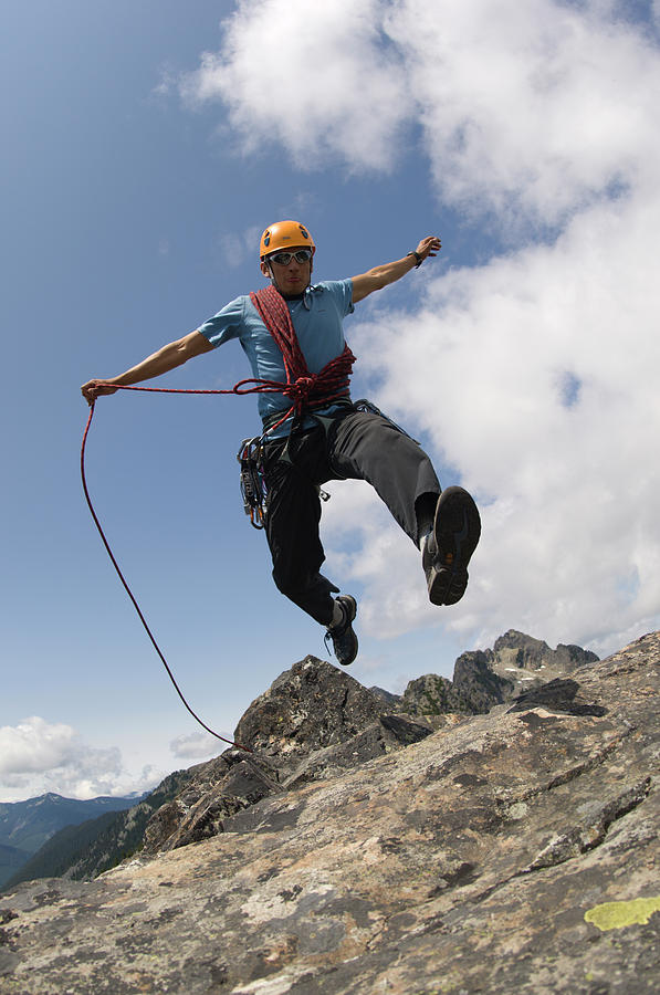 Climber Reppels Down Mountain Face Photograph by Heath Korvola - Fine ...