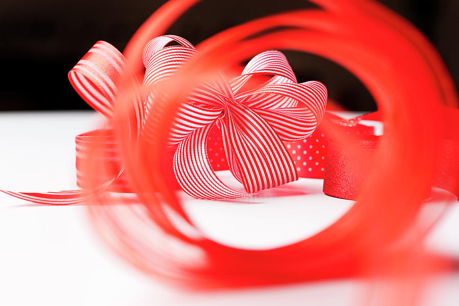 Close Up Of Decorative Red Ribbons #1 Photograph by Nils Hendrik Mueller