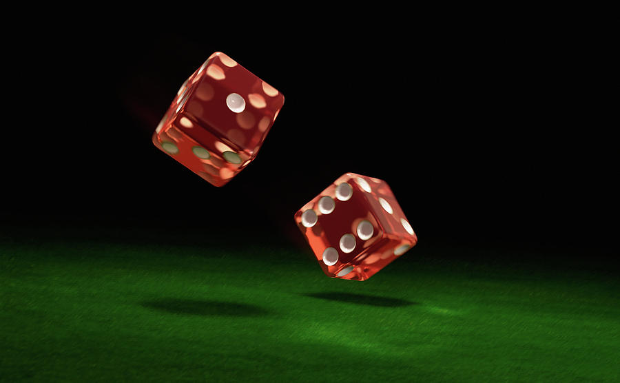 Close Up Of Two Rolling Dice Photograph by Ikon Images - Fine Art America