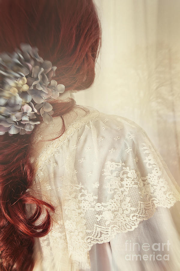 Closeup of a girl with long red hair and flower #1 Photograph by Sandra Cunningham