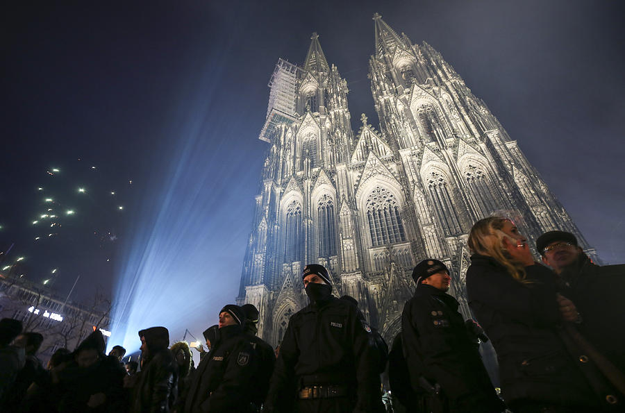 Cologne Celebrates New Years Eve Under Heightened Security Photograph by Maja Hitij Cologne Celebrates New Years Eve Under Heightened Security Photograph by Maja Hitij